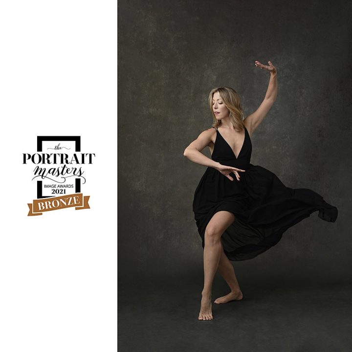 Portrait of dancer, dancing in a black dress