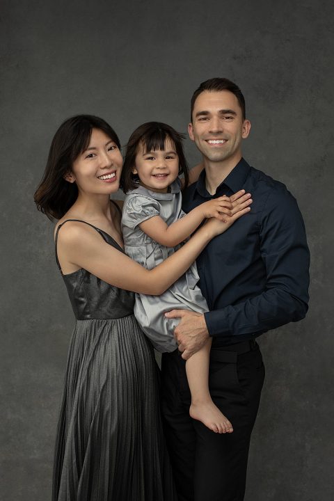 Plymouth NH studio portrait of a family with young daughter