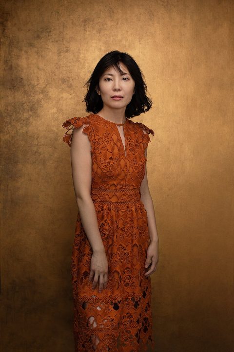 Portrait of Zi in lace dress with gold background