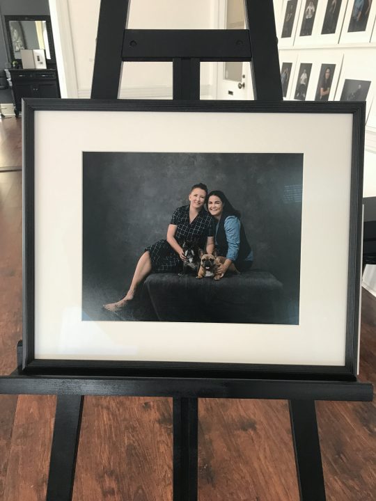 A cell photo of a custom framed portrait