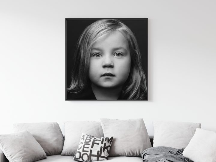 A black and white metal wall portrait