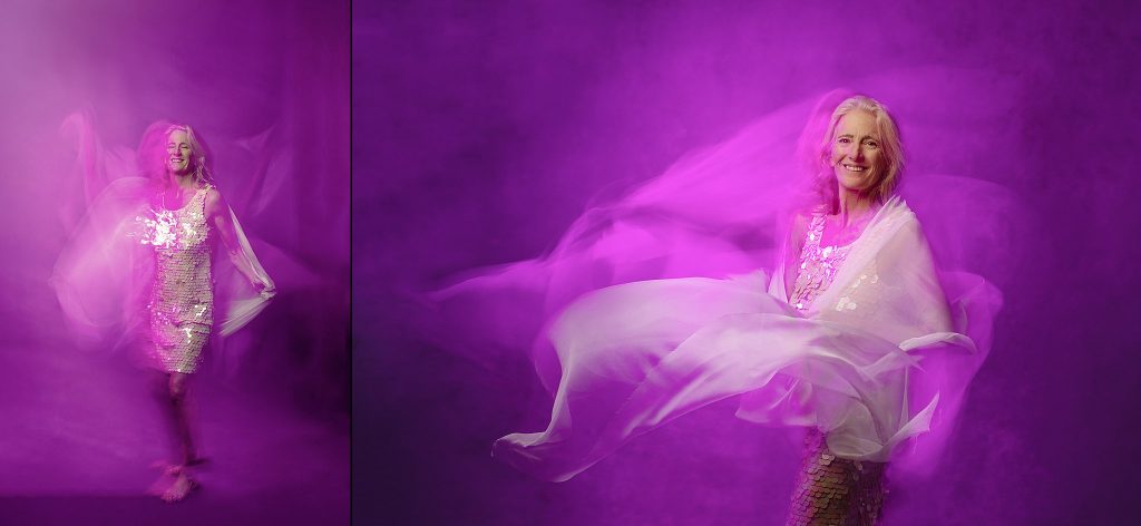 Two portraits of Melinda dancing in pink light, with motion blur, like a Disco