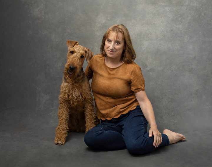 A casual portrait of a woman and her dog by Maundy Mitchell in Plymouth, NH