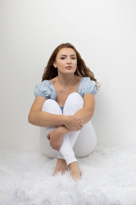 High school senior photo with white background