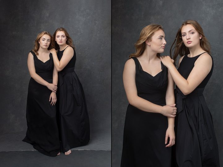Teenage sisters wearing black dresses