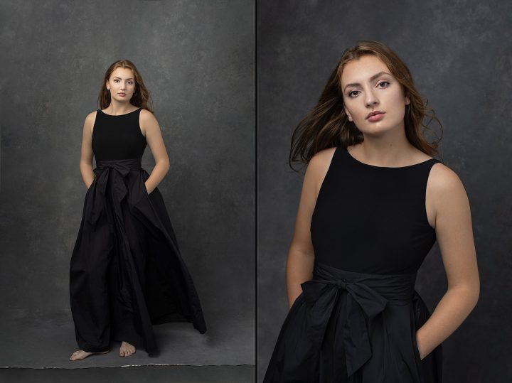 High school senior girl wearing a black dress