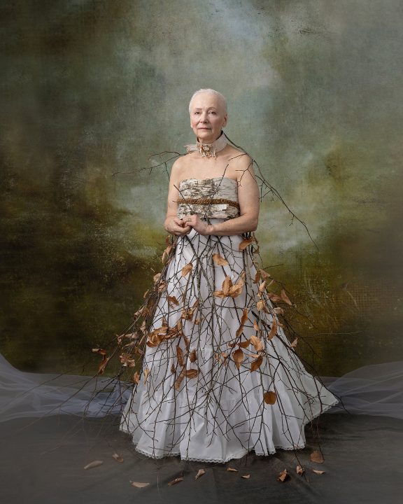"Winter's Mistress" - a Portrait of Rebecca wearing an outfit made from twigs and bark for the Over 50 Revolution at Maundy Mitchell Photography