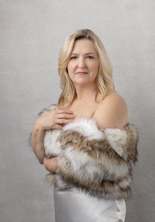 Portrait of MaryEllen wrapped in faux fur stole