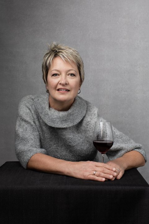 Portrait of Carol with a glass of wine for Unforgettable: the Over 50 Revolution