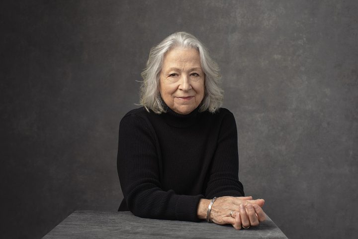 Portrait of Liz, wearing a black turtleneck during her photo session for the Over 50 Revolution