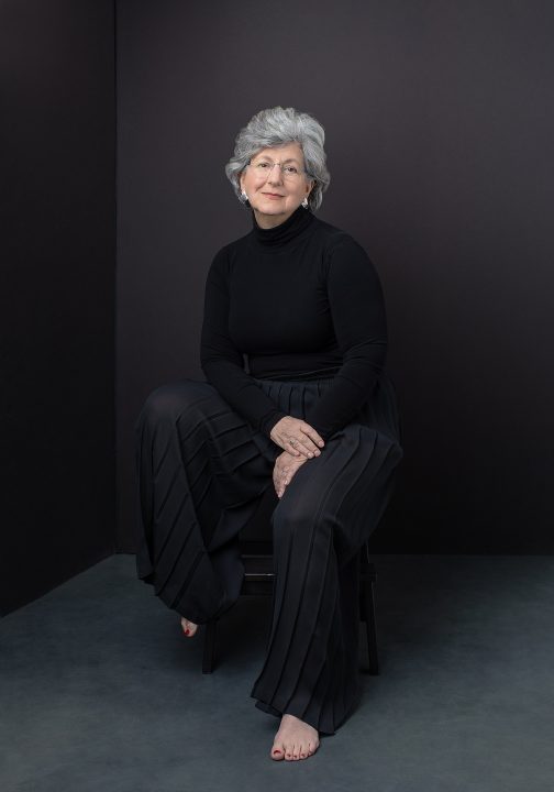 Portrait of Susan C. in black for Extraordinary: the Over 50 Revolution