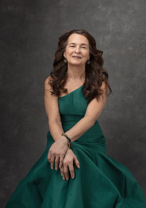 Portrait of Deb wearing a green gown for her session for Extraordinary: the Over 50 Revolution