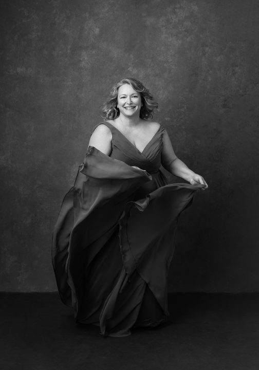 Black and white portrait of Nicole, dancing for her portrait experience, Extraordinary: the Over 50 Revolution