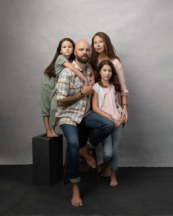 family photo to create lasting legacies - casual family portrait of Molly, Drew and their two young daughters