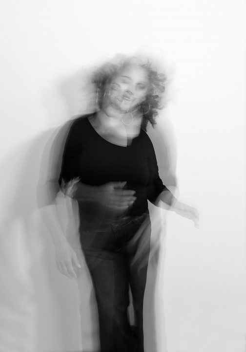 Slow shutter, black and white portrait of Cheryl for The Over 50 Revolution at Maundy Mitchell Photography