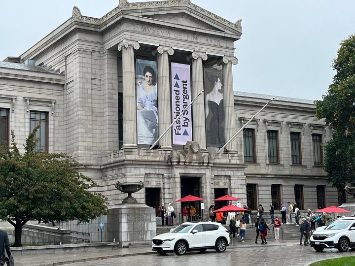 The exterior of the MFA Boston, with "Fashioned by Sargent" banners