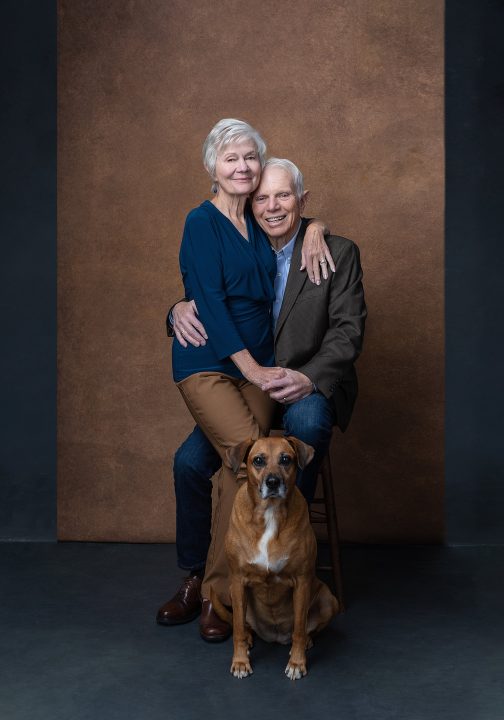 Casual studio portrait of a couple in their 80s with their dog for Extraordinary: the Over 50 Revolution
