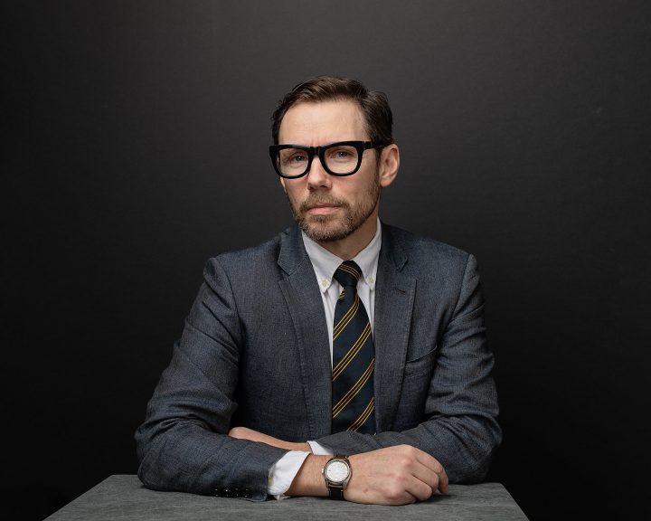 Business portrait of Jon with black background