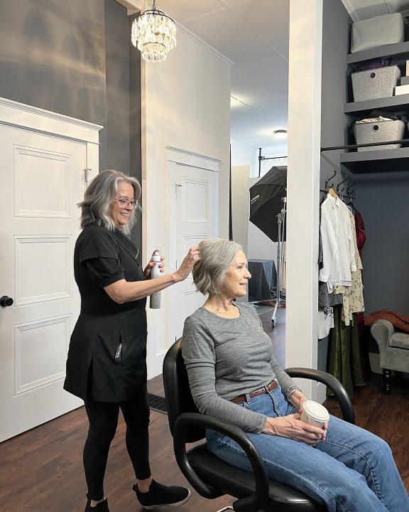 Georgia, enjoying professional hair and makeup styling by Dianne Sitar as part of her photo session for The Over 50 Revolution