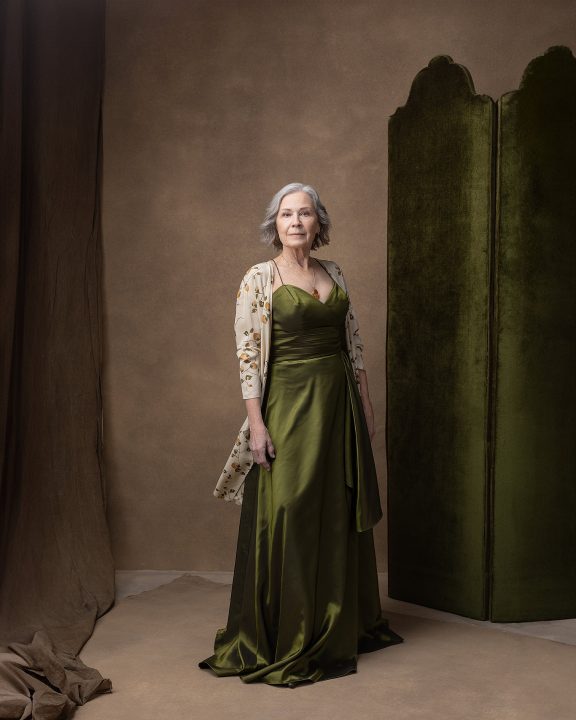 Portrait of Georgia wearing olive green silk gown for The Over 50 Revolution