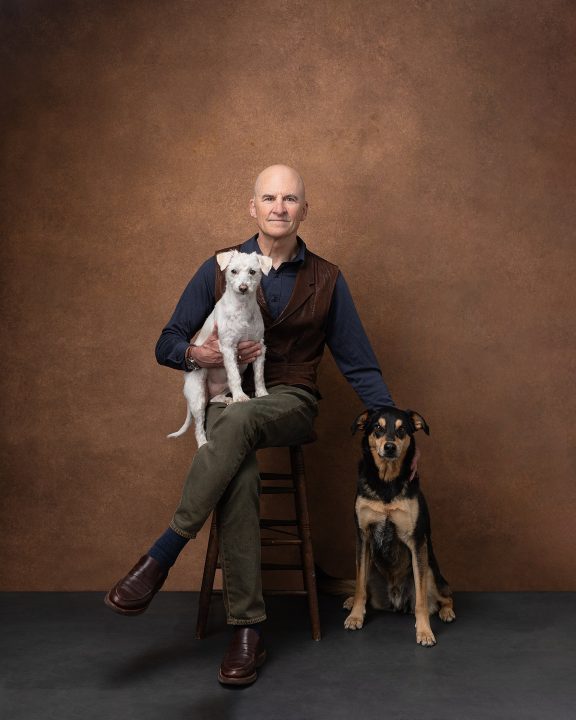 Portrait of Dan with two dogs