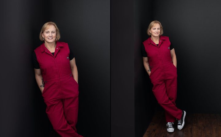 Two photos of Jess, an entrepreneur, who is leaning on a black wall and wearing a pink jumpsuit and Converse sneakers.