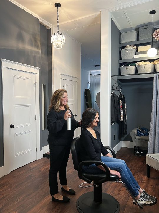 Lee's mother, enjoying hair and makeup styling at his senior photo session