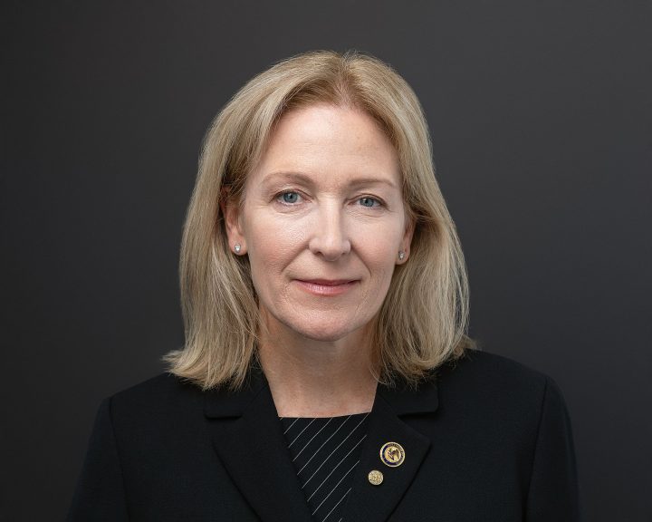 Headshot with a black background for a New Hampshire attorney