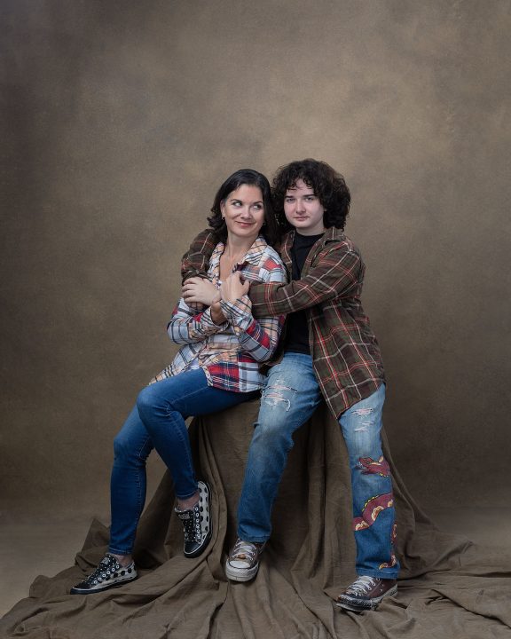 A portrait of high school senior Lee with his mother, Angie