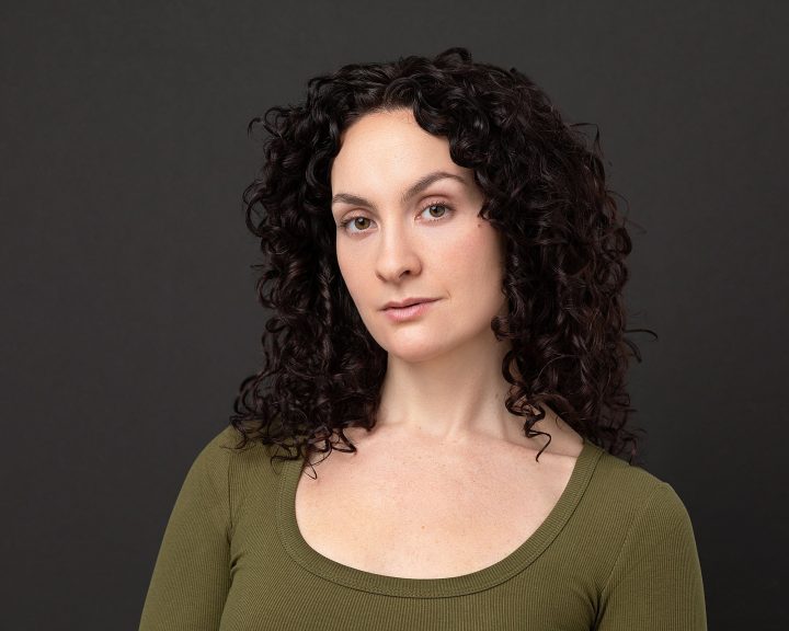 New headshot for Sally Rose - black background